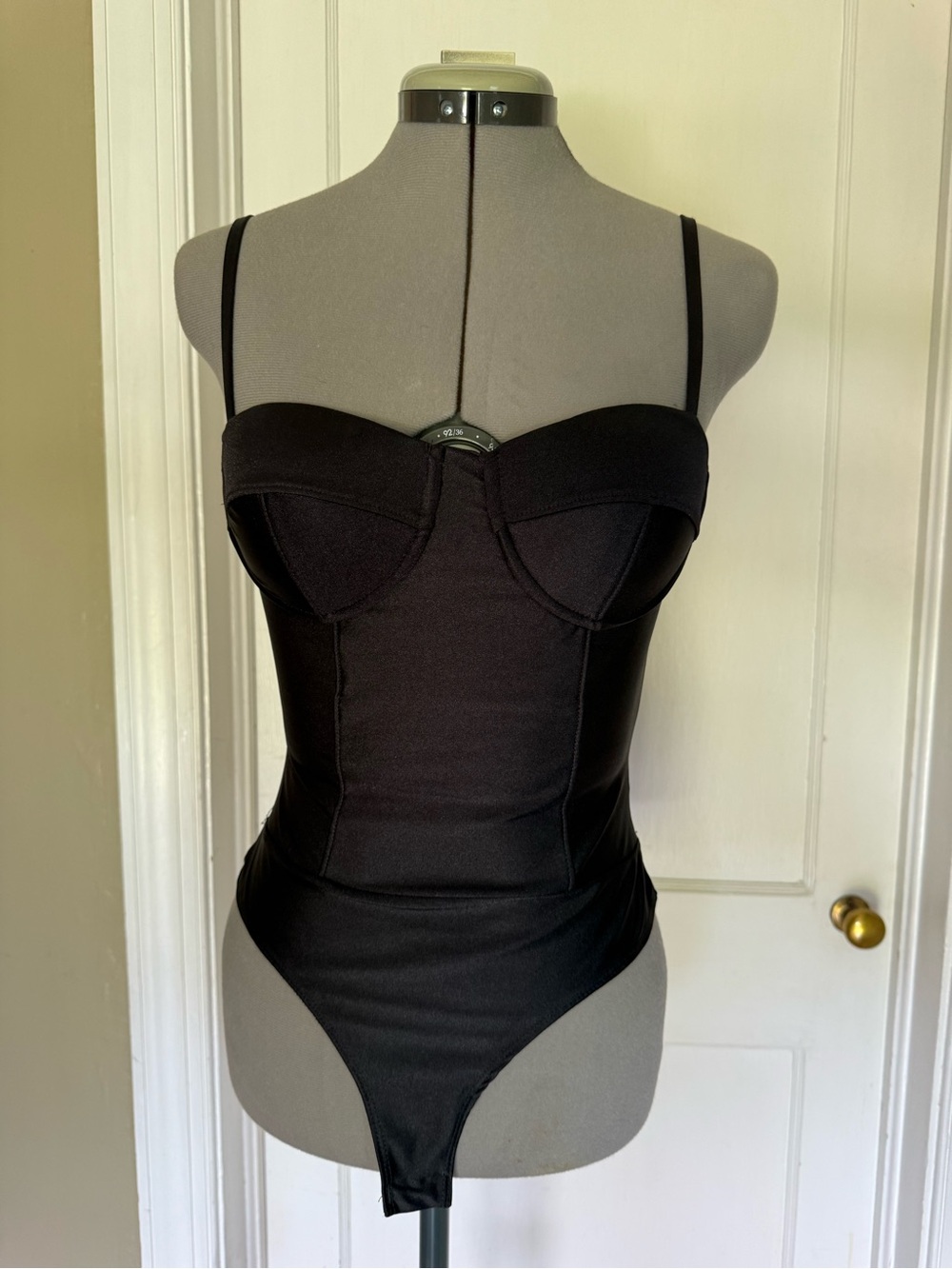 Black stretch bodysuit from Rainbow